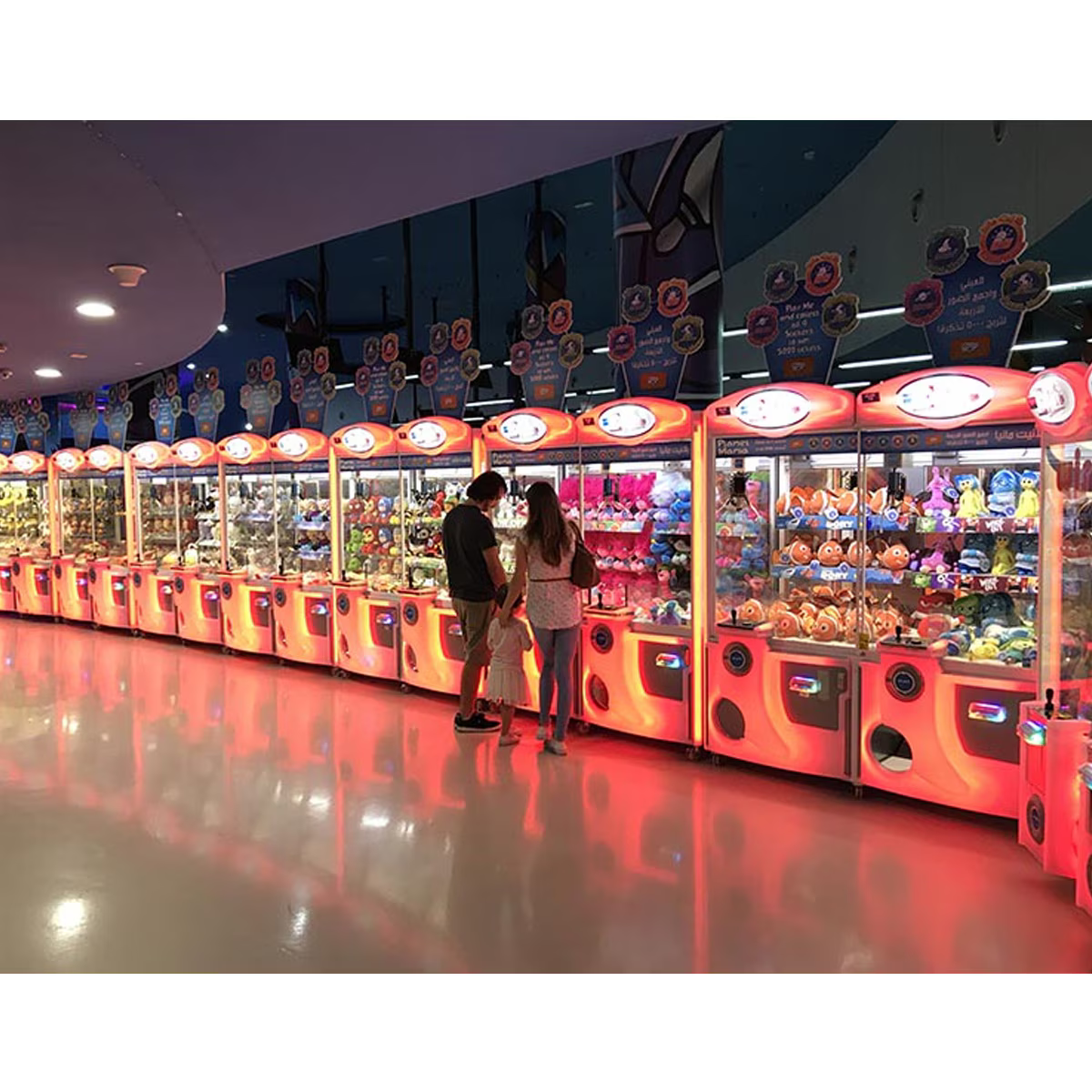 E-Claw 900 Crane Claw Machine Arcade Game Row of Machines