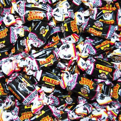 Big pile of wrapped Albert's Black Cherry flavored chews