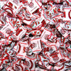 Big pile of wrapped Albert's Watermelon flavored chews