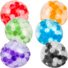 Close up of the 2 color bead balls in red, green, purple, orange, blue and black