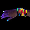 Glow in the dark view of the pop together jewelry 