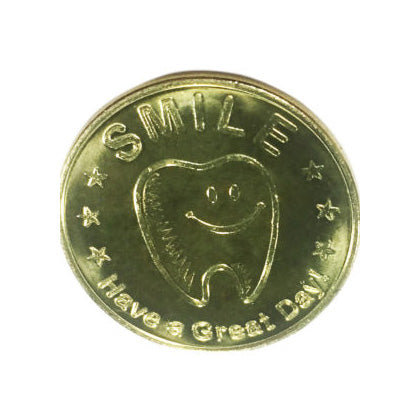 Close up of *** SMILE *** Have a Great Day! vending token