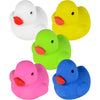 close view of duck eraser toys in the color white, yellow, green, pink and blue